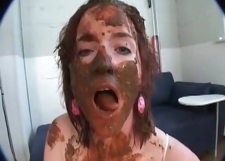 Huge tits and face covered in poop as she served a man