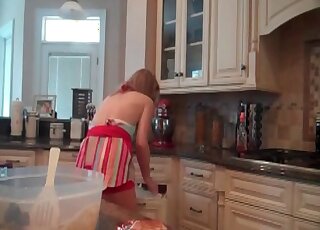 Housewife in the kitchen is ready to cook her poo