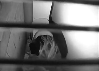 Black and white video of the toilet action